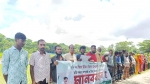 তালতলীতে জমি দখল ও মামলা দিয়ে হয়রানির অভিযোগে মানববন্ধন