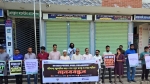 জীবাশ্ম জ্বালানির প্রকল্প বন্ধের দাবিতে কলাপাড়ায় মানববন্ধন